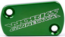 Charger l'image dans la galerie, Green engine clutch cover by WORKS, showcasing a durable, high-quality clutch cover for motorcycles or engines.