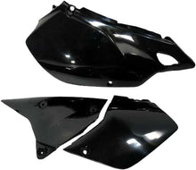 Load image into Gallery viewer, Acerbis black side panels for motorcycle, featuring a sleek design and durable plastic construction, shown installed on a bike.