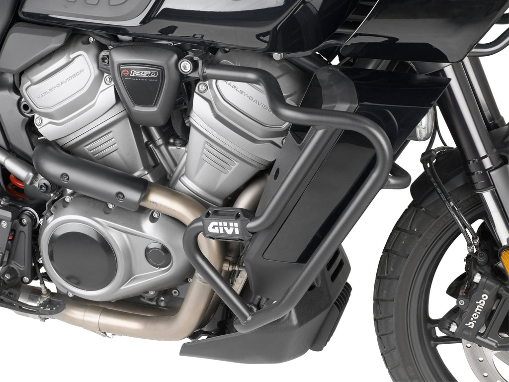 GIVI engine guards HD 270-6140 showing sturdy metal braces designed to protect motorcycle engine in a natural setting