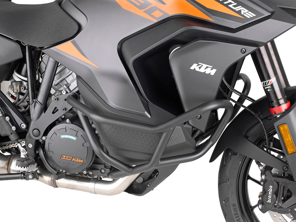GIVI engine guards for KTM motorcycle, durable metal braces protecting engine area, with black finish and mounting hardware.