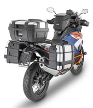 Load image into Gallery viewer, GIVI KTM side case hardware and fasteners for secure mounting, shown in close-up on a KTM motorcycle.