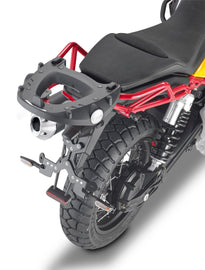GIVI top case hardware and fasteners for secure mounting, showing metal fittings and brackets for motorcycle luggage.