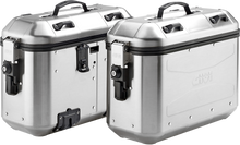Load image into Gallery viewer, Pair of GIVI Dolomiti Monokey side cases in silver, 36L luggage for motorcycles, shown mounted on a bike.