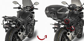 GIVI V35 side case hardware mounts and brackets for motorcycle luggage storage, shown in close-up view.
