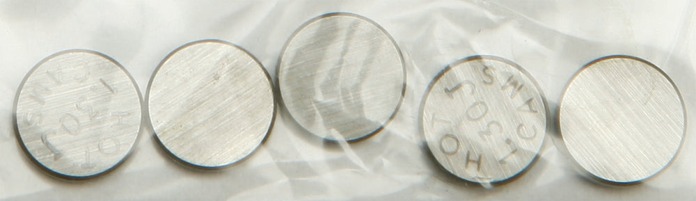 Hot Cams engine valve shims in 7.48x1.30mm size, 5-pack, showing metal shims with precise dimensions for motorcycle engine tuning.