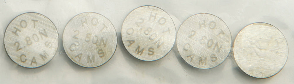 Hot Cams engine valve shims, 9.48x2.80mm, 5-pack, for motorcycle valve adjustment, with brand name visible on the product.