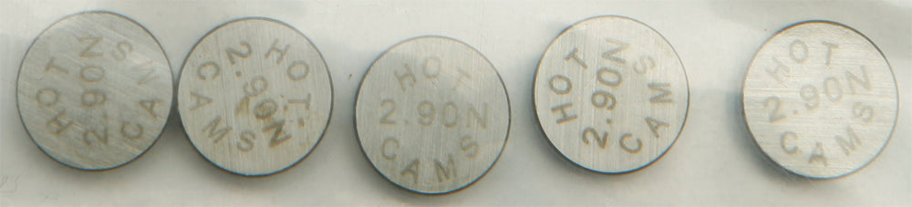 Hot Cams engine valve shims, 9.48x2.90mm, set of 5, for motorcycle engine maintenance, shown close-up.