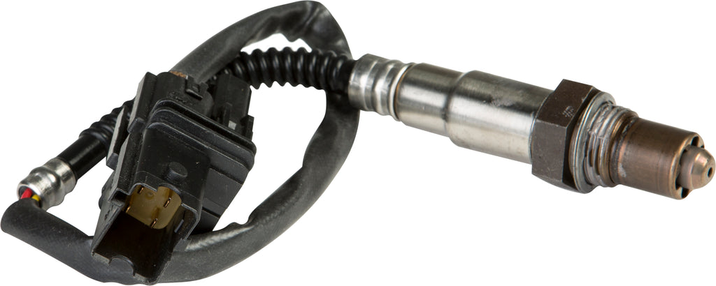 Koso North America oxygen sensor wide band 27-5724 for engine management, shown in close-up view of the sensor and wiring.