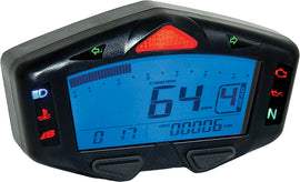 Koso North America DB-03R digital LCD gauge displaying speed, RPM, and engine data on a motorcycle dashboard.