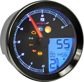 Koso North America Koso TNT-B gauge in black, mounted on a Yamaha bike, showing digital display and control buttons.