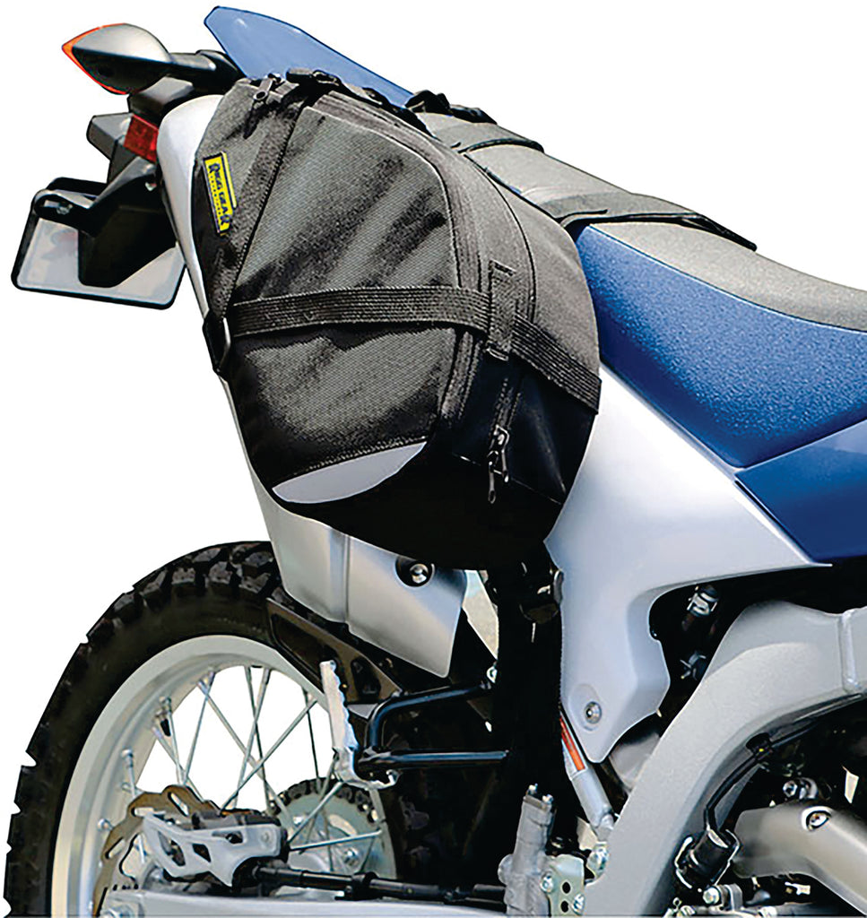 Nelson-Rigg Trails End dual sport saddlebag in black, with 12/15L capacity, mounted on a motorcycle for outdoor adventure rides.
