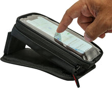 Load image into Gallery viewer, Nelson-Rigg Route 1 magnetic phone holder in black mounted on a vehicle, designed for secure smartphone attachment during rides.