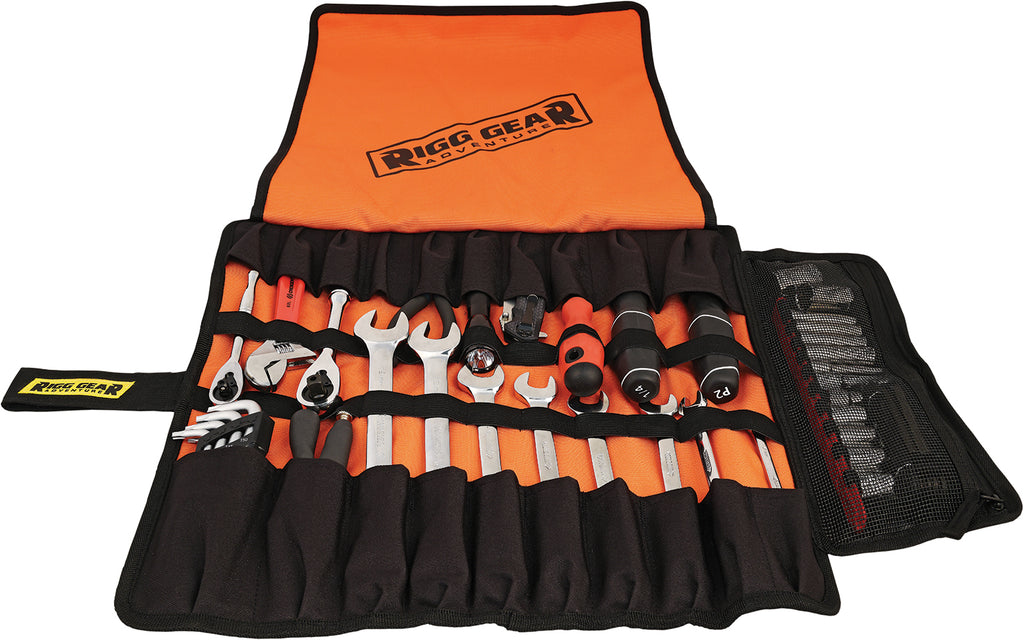 Nelson-Rigg Trailsend large tool roll with multiple compartments, black fabric, and zipper closure for organized tool storage.