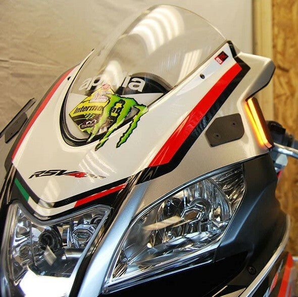 New Rage Cycles front LED turn signals for motorcycles, illumination product with clear lens and mounting brackets.