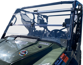 Open Trail folding windshield for off-road vehicles, clear windscreen with black frame and folding hinges.