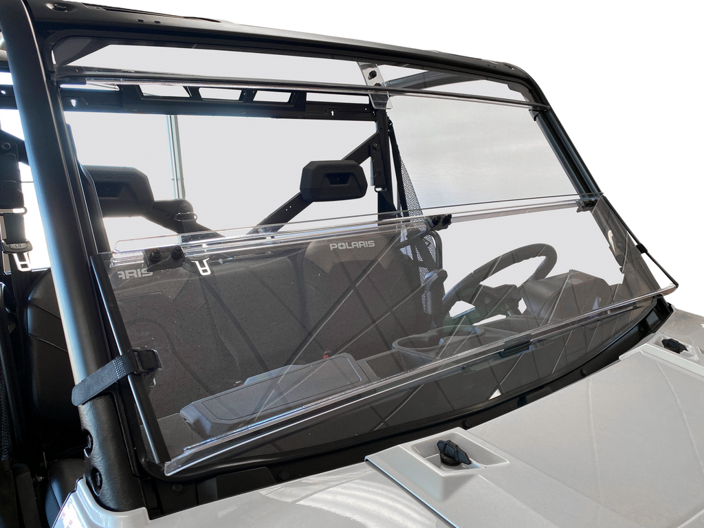 Open Trail folding windshield for off-road vehicles, clear windscreen with frame, designed for open trail protection.