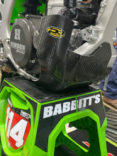 Load image into Gallery viewer, P3 Carbon Fiber Skid Plates and Guards for Kawasaki KX 670-306052, durable protective motorcycle braces on a white background.