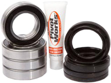 Load image into Gallery viewer, Pivot Works front wheel bearing kit 52-0344 drive component, showing the set of bearings and metal parts in the image.