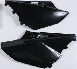 Black Polisport Plastics side panels for body, model 64-6064, showing the sleek plastic design on a motorcycle.