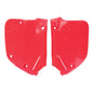 Red Polisport Plastics side panels for CR125/250 motocross bikes, showcasing durable body panels with a sleek finish.