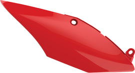 Red Polisport Plastics side panels for motorcycle body, featuring sleek design and durable plastic construction.