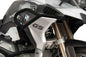 Black PUIG engine guards for BMW, body protection accessory with visible mounting points and sleek black finish.