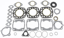 Load image into Gallery viewer, SP1 full gasket set with multiple gaskets and seals, designed for automotive engine repair and maintenance.