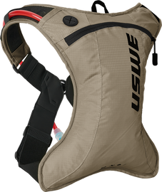 USWE Outlander Moto 2L Hydro Pack in sand color, compact motorcycle luggage with hydration reservoir for riding adventures.
