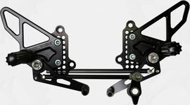 Black VORTEX rear set foot controls for Ducati, complete with foot pegs and shift/brake levers, designed for motorcycle performance.