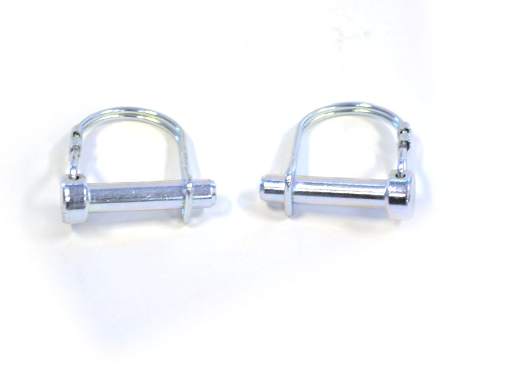 Warn plow clevis pin for Suzuki, mounted on brackets, used for attaching plow components securely.