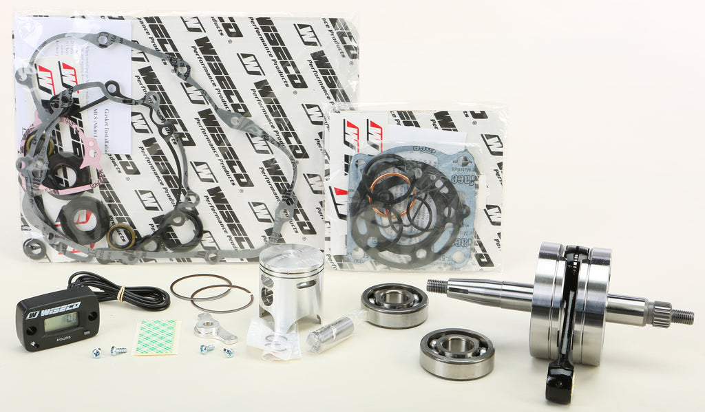 Wiseco engine rebuild kit for Garage Buddy Kaw PWR164-101, featuring pistons, gaskets, and engine components for repair.