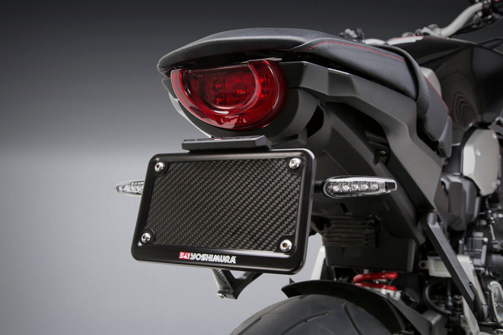 Yoshimura Fender Eliminator Kit for Honda motorcycles, black body with mounting hardware and sleek design.