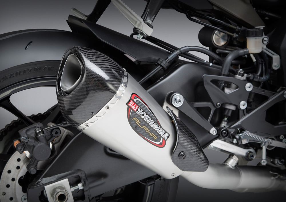 Yoshimura Race Alpha-T slip-on exhaust for motorcycles, featuring stainless steel and carbon fiber components.
