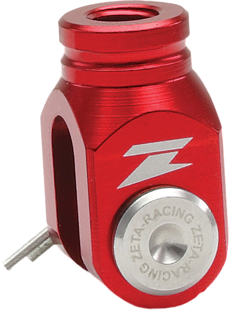 ZETA red rear brake clevis for Honda CRF250 motorcycle, close-up of durable metal component with branding markings
