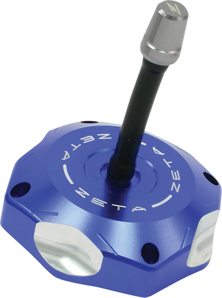 Blue ZETA billet gas cap for off-road vehicles, featuring a durable design and vibrant finish for secure fuel access.
